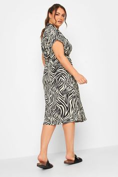 Refresh your casual dress collection with this new-in midaxi dress. Made from a comfortable fabric, this dress features an adjustable tie waist, a chest pocket, collar neck, short sleeves and is complete in an all over print. Style with trainers for the perfect on-the-go outfit. Elegant Wedding Guest Dress, Midaxi Dress, Plus Swimwear, White Zebra, Next Fashion, Plus Size Kleidung, Black Shirt Dress, Dresses Uk, Fashion Furniture