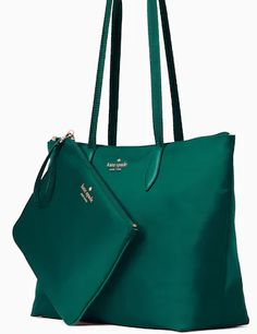 10.8"h x 14.2"w x 6.2"dhandle drop: 11"polyestertrim: smooth pvcmetal pinmount logotwo way spade jacquard lininginterior detachable wristlet for the bag to fold intozip top closurestyle # wkr00625Color: Deep Jade Elegant Formal Nylon Bag, Elegant Nylon Tote Bag, Elegant Nylon Shoulder Bag For Shopping, Luxury Green Nylon Bag, Elegant Top Handle Nylon Bags, Elegant Nylon Top Handle Bags, Elegant Nylon Bag For On-the-go, Kate Spade Outlet, Nylon Tote