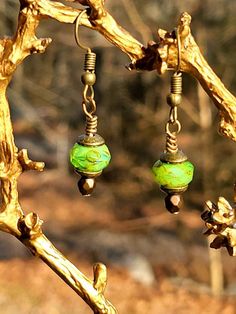 Love the rustic appeal with these Picasso Czech glass Earrings. The green catches the sun and just pops with color.  Simple but make an artistic classy statement.  Handmade and hypoallergenic. Gift wrapping available and Wholesale orders Welcome Artsy Green Earrings For Gift, Handmade Glass Bohemian Earrings, Artsy Green Drop Earrings, Unique Green Czech Glass Earrings, Artistic Green Earrings For Gift, Green Artsy Drop Earrings, Handmade Green Jewelry With Czech Glass, Handmade Green Czech Glass Jewelry, Vintage Green Czech Glass Earrings