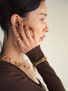 Editor's NotesELISE.J isan eco-friendly jewelry brand based in San Francisco. Inspired by the naturalbeauty of California, its jewelry brings joy and happiness to everyday life.Double gold ring can be a stylish point item with no need other layered rings. Luxurious touch upgrades yourlook. - Three types of connected gold rings-Simple but unique point- Adjustable open back design- Goldfilled process which is 15-20 times thicker and less discolored than gold plated Measurements(in.)- Siz Gold Rings Simple, Layered Rings, Eco Friendly Jewelry, Jewelry Brand, Rings Simple, Jewelry Branding, Gold Ring, Open Back, Sensitive Skin