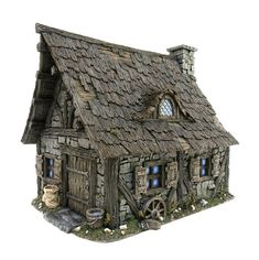 a small house made out of wood and stone