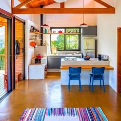 the kitchen is clean and ready to be used as a dining room or living room