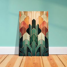 an art deco painting on wood flooring in front of a wall with blue walls