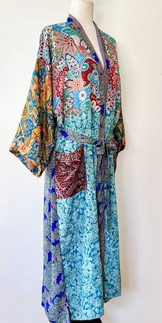 Luxury Silk Blend Kimono Duster: Elegant. This Kimono has a beautiful finish, printed on a classic patern. Creates depth, interest, and designer appeal. Luxurious fabric, soft, opaque. The perfect duster for cocktail parties, resort, beach or poolside cover-up. Adapts well to a duster coat or dress.A stunning mix of deep contrasting colors, turquoise, wine, pink, etc. Great gift for Easter, Mother's Day, Birthday, or just because you deserve it. Fabric is soft and drapes perfectly. Designed as a duster kimono with multiple style options. Wear open and flowing over a pantsuit, slip dress (looks incredible), belted as a cocktail dress. Material is opaque, pliable and holds it's shape.Definite designer look, elegant. You decide on the styling. Great for travel. Perfect for parties, summer, an Kimono Duster, Luxury Silk, Silk Kimono, Mixing Prints, Luxury Fabrics, Silk Printing, Contrasting Colors, Duster Coat, Long Dress