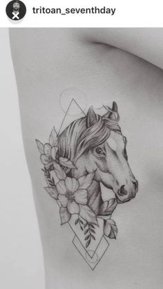 a woman's stomach with a horse and flowers tattoo on the side of her body