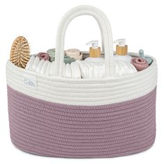 a white and purple basket with some items in it