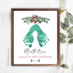 a baby's first christmas card with the word merry written in green and red