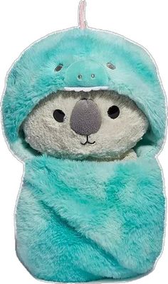 a stuffed koala is wrapped up in a blue blanket and wearing a hoodie