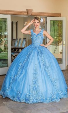 Long v-neck a-line quinceanera ball gown with removable draped sleeves. Princess Style Quinceanera Ball Gown For Gala, Princess Style Quinceanera Dress For Debutante Ball, Elegant Quinceanera Dress For Gala During Prom Season, Elegant Ball Gown Quinceanera Dress For Gala, Elegant Quinceanera Ball Gown For Gala, Ruffled Ball Gown Quinceanera Dress, Blue Quinceanera Dress For Prom Season, Ruffled Ball Gown For Quinceanera, Blue Quinceanera Dress For Gala During Prom Season