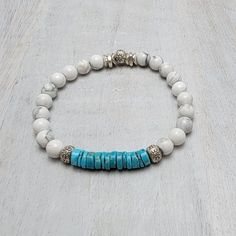 Our SOLFUL SIMPLE Collection is designed to gently remind us of the quietness within ourselves and the openness to connect with others. Its simplicity allows you to keep your piece "simple" or to add one of our meaningful charms.  This Howlite gemstone bracelet features Campitos Turquoise Heishi Beads with sterling silver accents.   * Howlite gemstones - 6mm  * Heishi Campitos Turquoise  * Sterling silver accents * Quality stretch elastic - 1mm (Bracelet sizes in drop-down. See photos for sizing chart) * Mini-polishing cloth * Gift box Click here to shop for Affirmation Heart Charms: https://etsy.me/39TyMEP We appreciate you stopping by and hope you find a SOLSISS piece that calls to you. Terri & Donna ~ SOLSISS™ *PLEASE READ: Lava and natural gemstones have slight variations of color, smo Handmade White Beaded Bracelets, Bohemian Hypoallergenic Turquoise Beaded Bracelets, Bohemian Turquoise Beaded Hypoallergenic Bracelets, Adjustable Turquoise Beaded Bracelets In Holistic Style, Howlite Bracelets With Round Beads As Gift, Adjustable Howlite Beaded Bracelets With Round Beads, Adjustable Howlite Bracelet With 8mm Beads, Adjustable Howlite Stretch Bracelet With Round Beads, Adjustable Howlite Beaded Bracelets