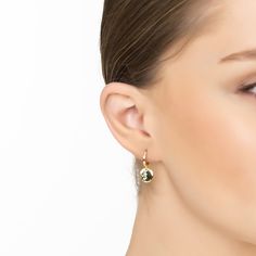 Elevate your style to celestial heights with our Gold Lunar Moon Huggie Hoop Earrings. These earrings feature a round disc dangling from the hoop, half of which is textured to depict the crescent moon cradled by the full moon, a design that whispers tales of the lunar mystique. The moon in jewellery often represents growth, creativity, and the unfolding of spiritual layers, imbuing these earrings with profound symbolism alongside their aesthetic appeal. Handcrafted in 925 Sterling Silver dipped in 18ct gold.   Packaging:  This item is presented in Latelita London signature packaging.  Care Instructions:  To maintain your jewellery, wipe gently with a damp cloth that is soft and clean. Do not soak in water. Avoid contact with soaps, detergents, perfume, or hair spray.  Do not store inside t Yellow Gold Moon Charm Drop Earrings, Yellow Gold Drop Earrings With Moon Charm, Modern Jewelry With Moon Charm, Elegant Dangle Hoop Earrings With Moon Charm, Modern Round Jewelry With Moon Charm, Modern Round Moon Charm Jewelry, Elegant Single Round Disc Earring, Elegant Round Disc Jewelry, Adjustable Moon Charm Earrings