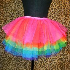 Nwt Club Exx Tutu Skirt Size Xs From Dolls Kill Elastic Waist Waist Measures 13" Unstretched Up To 17" Length 14" Club Exx Just Dance Tutu Skirt Cuz Life's A Celebration. This Mini Skirt Comes In A Layered Tulle Construction, With An Elastic Waistband, And Rainbow Pattern. Spring Costume Skirt With Attached Cancan, Spring Party Can-can Petticoat, Can-can Skirt For Costume Party, Rave Skirt For Spring Party, Spring Rave Skirt For Party, Spring Rave Party Skirt, Spring Party Rave Skirt, Rave Style Skirt For Spring Party, Pink Fitted Halloween Skirt