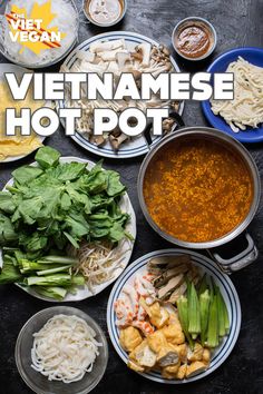 the cover of vietnamese hot pot is shown with various dishes and vegetables in bowls around it