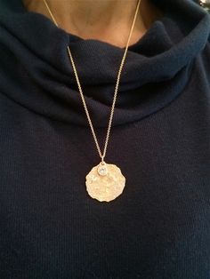 If you want to pay with PayPal, please contact me. Necklace details: * The necklace and the pendant made from 14 karats solid yellow gold. * Chain length 17.7inc\ 45cm. * 1 Diamond 0.50ct HVS1. * 50 Diamonds 0.50ct 0.01ct each HVS1. * Gold pendant size 1inch/ 25mm. Each pendant is custom made unique and will have slight variations in shape. Special delicate gold pendant bezel set with natural diamonds. Look like an antique pendant removed from the ground. Hand-made one of a kind. Chain available Gold Plated Pendant Diamond Necklace, Gold Medallion Diamond Necklace With Single Cut Diamonds, Gold Medallion Diamond Necklace Gift, Gold Medallion Diamond Necklace As Gift, Gold Medallion Diamond Necklace For Gift, Yellow Gold Medallion Necklace With Single Cut Diamonds, Elegant Gold Diamond Necklace With Large Pendant, Gold Pendant Diamond Necklace, Diamond Necklace With Large Pendant As Gift