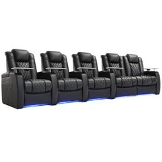 a row of black leather reclining chairs with blue lights on the sides and armrests