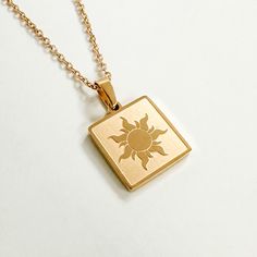 Inspired by our favorite girl Punzie, this Lost Princess Necklace is for everyone out there who’s got a dream! This necklace is dainty and great for minimal everyday wear! Necklace chain is 18" with lobster clasp. Pendant is 1/2" square. Pairs perfectly with our Best Day Ever necklace, tee, hoodie or crewneck! Everyday Rose Gold Necklace With Square Pendant, Nickel-free Rectangular Pendant Necklace For Everyday, Everyday Charm Necklace With Square Pendant And Adjustable Chain, Everyday Tarnish-resistant Square Pendant Necklace, Stainless Steel Square Pendant Necklace For Everyday, Everyday Charm Necklace With Square Pendant, Everyday Charm Necklaces With Delicate Chain And Square Pendant, Everyday Charm Necklaces With Square Pendant And Delicate Chain, Everyday Rectangular Charm Necklace With Delicate Chain