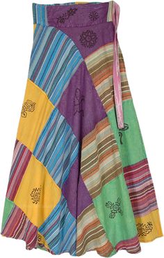 A multicolored stonewashed alternative patchwork wrap skirt with mystic symbol prints on some patches.  This is a colorful cotton wrap around skirt with flexible wrap around waist; no hole in the waist like a normal wrap style - tie over the strap over the waist. #tlb #WrapAroundSkirt #Patchwork #CottonWrapSkirt #PatchworkSkirt #HippieSkirt