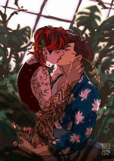 a man and woman kissing in front of plants