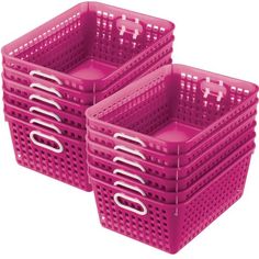 three pink plastic baskets sitting next to each other