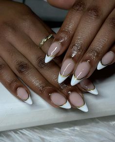 Gorgeous, almond Frenchies with gold line cute for any season #fashion #nails #nailart #nailsofinstagram #frenchnails #gold #bows #newyearnails #newyearnewme Almond French White Nails, Black Tip With Gold Line Nails, New Years Inspo Nails, Almond French Tip Nails With Gold Line, Black French Tip Nails Almond With Gold, Almond French Tip With Gold Line, Gold Line French Tip, White French Tip Nails With Gold Line, French With Line Nails