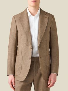 Crafted in Northern Italy from 100% pure linen, treated to obtain a unique natural stretch for breathability and comfort. Designed with a single-breasted 2-button closure, fine sartorial details and a tailored profile for an elegant look.     Cut in a slim yet comfortable fit, this elegant suit jacket has an unstructured profile and is half lined for lightness and a relaxed appeal. Artisanal details like AMF stitching and sartorial details like the notch lapel and patch pockets make this blazer Timeless Linen Blazer With Lapel Collar, Fitted Linen Suit With Welt Pockets, Fitted Linen Suits With Welt Pockets, Fitted Linen Blazer With Pockets, Tailored Linen Blazer With Welt Pockets, Linen Business Blazer With Welt Pockets, Business Linen Blazer With Welt Pockets, Linen Blazer With Welt Pockets For Business, Classic Linen Blazer With Pockets