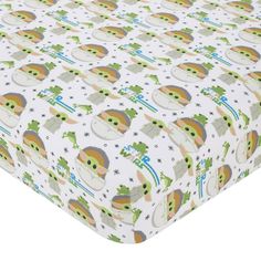 the baby yoda pattern is shown on this fitted crib bedding set with white sheets