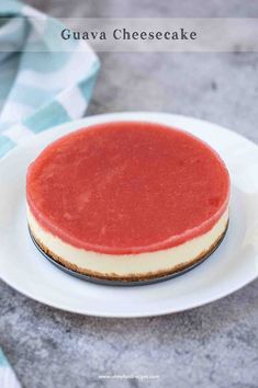 a small cheesecake on a white plate