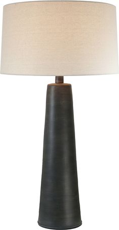 a black table lamp with a white shade on it's base and a beige linen lampshade