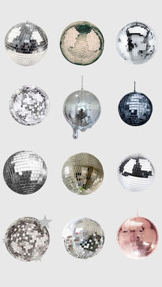 many shiny disco balls hanging from the ceiling