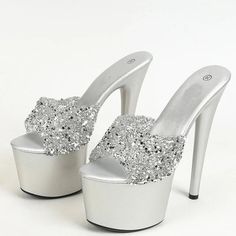 Step up your shoe game with these sassy sequined stilettos! The Gala Platform Sequin Stiletto Heels add sparkle and height to any outfit. Bring the party wherever you go with these flashy and fun heels. Gender: WOMEN Item Type: High Heels, Sandals Upper Material: PU, Synthetic Leather Outsole Material: RUBBER Insole & Lining Material: PU Lining Material: PU Platform Height: 7 cm/2.75" Heel Height: 17 cm/6.7" SIZE CHART Size Heel to Toe CM Inch 35 22.5 8.86 36 23 9.06 37 23.5 9.25 38 24 9.45 39 2 Novelty Shoes, Sequin Sandals, Clear High Heels, Extreme High Heels, High Heel Slippers, Summer Heels, Red High Heels, Platform Stilettos, Super High Heels