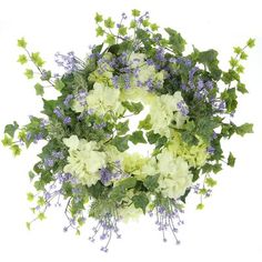 a wreath with white flowers and green leaves