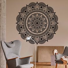 a large black and white wall decal with an intricate flower design on the side