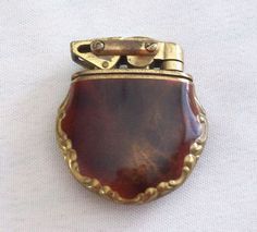 an antique gold and tortoise shell brooch