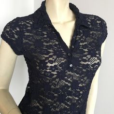 Calvin Klein Navy Floral Lace Cap-Sleeved Top With Collar And Half Button Up Neckline. Fabric Is Very Stretchy. Not Lined. Size Xs. Approximate Measurements Taken Laying Flat And Relaxed: Bust 32" (Mannequin 34") Back Length 22" (Without Collar) Shoulder Width 14". In Excellent Condition. Nwot * Please Do Not Use My Photos Without Permission Blue Fitted Top With Collared Neckline, Blue Fitted Blouse With Collared Neckline, Fitted Blue Blouse With Collared Neckline, Casual Collared Tops By Calvin Klein, Casual Calvin Klein Collared Top, Calvin Klein Casual Collared Top, Classic Calvin Klein Tops For Spring, Fitted Calvin Klein Blouse For Work, Spring Calvin Klein Button-up Tops