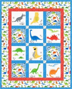 a quilt with dinosaurs on it