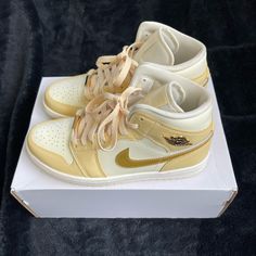 Selling Used Women’s Nike Air Jordan 1 Mid Se In Us 8.5. Pale Vanilla/Metallic Gold. I Don’t Wear High Tops Much - They Don’t Really Suit Me. Worn Twice. Will Come With The Box. Comes From A Dog-Owner. Nike Gold High-top Custom Sneakers, Nike Gold High-top Sneakers, Nike Gold Leather Custom Sneakers, Gold Nike Leather Custom Sneakers, Gold Leather Nike Custom Sneakers, Custom Cream Sneakers With Perforated Toe Box, Nike Custom Gold Round Toe Sneakers, Gold Nike Custom Low-top Sneakers, Nike Custom Gold Sneakers