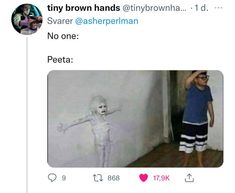 a tweet with a photo of a creepy doll on it's side