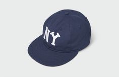 This 100% cotton cap honors the 1935 New York Black Yankees of the Negro Leagues. Its simple, enduring design features a leather strapback, broadcloth undervisor, and one size fits most sizing. Sandlot Goods is proud to be in collaboration with the Kansas City-based Negro Leagues Baseball Museum to honor the rich history of African American baseball. A portion of the profits from any purchase of this collection will go directly to the Negro Leagues Baseball Museum. 100% Cotton Cap Green Broadclo Sandlot, The Sandlot, Proud To Be, Kansas City, Kansas, African American, Design Features, Antique Silver, New York