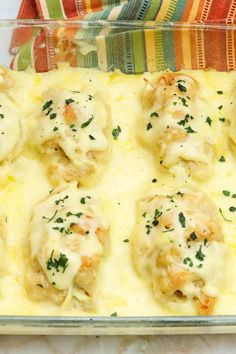 a casserole dish with meatballs covered in gravy