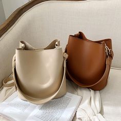 Caroline Bag Material: PU, Polyester Colors available: Black, Khaki, Brown, Coffe, Green, Wine Red Size: upper length 18cm*Lower length 24cm*height 23cm*thickness 16cm Note: 1 Inch=2.54 CM; 1 CM=0.39 Inch , Due to different batches, bag's liner may be different. We pay your attention on the fact that different computer screens can display different colors even though this is one and the same color. Therefore color of the received good can be a little bit different than the good on the photo. Bucket Handbags, Bags Luxury, Do You, Designer Shoulder Bags, Types Of Bag, Shoulder Purse, Wide Straps, Casual Bags, Large Bags