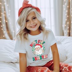 "Don't Stop Believin Christmas Shirt, Holiday Kids Shirt, Funny Christmas Shirt, Santa Toddler Christmas Shirt, Merry Christmas Baby Onesie® Welcome to SareKidsStyle! HOW TO ORDER * Please review all the information provided before placing an order. 1. Select the style and size using the drop-down menu. 2. Select color 3. [APPLICABLE ONLY ON CERTAIN LISTINGS] Follow the instructions to fill out the \"Add your personalization\" option, e.g., specifying custom sayings or selecting design colors. 4. Select quantity Need more Items? Add the current item to the cart. And if you like to add more items to your order, please press the back button and repeat steps again. 5. Once all your desired items are in your cart you may complete your order by entering your payment method, desired shipping add Christmas Baby Onesie, Christmas Cookies Kids, Toddler Christmas Shirt, Merry Christmas Baby, Christmas Toddler, Christmas Shirts For Kids, Santa Shirt, Christmas Tree Shirt, Santa Shirts