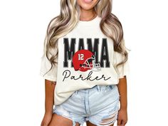 Show your pride on game day with our custom Football Mama shirt, featuring a football helmet and personalized with the player's name and number. This perfect gift for any football mom combines fashion and sentiment, making it a must-have for every football lover. COMFORT COLORS 1717 SHIRT: Unisex 100% US cotton - ethically grown and harvested Pre-Shrunk Fabric Relaxed Fit - Size up for a trendy oversized look Seamless Sides Double Needle Stitching Garment-dyed  CARE INSTRUCTIONS: Wash inside out Collegiate Customizable T-shirt For Football Season, Game Day Customizable White T-shirt, Customizable White T-shirt For Game Day, Customizable Fan Apparel T-shirt For Game Day, Customizable Sublimation Short Sleeve For Game Day, Customizable Short Sleeve Sublimation Design For Game Day, Football Mom Shirts Ideas Sons, Football Mom Outfit