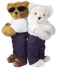 two teddy bears dressed in jeans and sunglasses