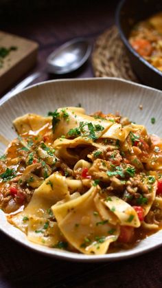 Lasagna soup is everything you’ve been dreaming of this fall. Imagine all the comforting, cheesy, and savory flavors of classic lasagna—tender pasta, rich tomato sauce, and creamy ricotta—served up in a cozy bowl of soup. This Lasagna Soup is the ultimate way to enjoy your favorite Italian dish with the ease of a one-pot meal, perfect for chilly evenings or anytime you’re craving something hearty. Lasagna Soup With Ricotta, Crock Pot Inspired Lasagna Recipes, Veggie Broth, Classic Lasagna, Lasagna Pasta, Classic Italian Dishes, Lasagna Soup, Bowl Of Soup, Aromatic Herbs