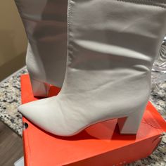 Never Worn Brand New White Casual Heels Medium Width, Casual White Heels Medium Width, White Block Heel Shoes For Fall, Winter White Heels Medium Width, White Ankle-high Heels For Fall, White Medium Width Heels For Winter, White Synthetic Heels For Fall, Trendy White Heels For Fall, Casual White Ankle Boot Heels