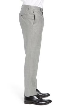 A tapered-leg cut shapes modern-classic trousers fashioned from finely textured wool. Style Name:Ted Baker London Jefferson Flat Front Wool Dress Pants. Style Number: 519066.