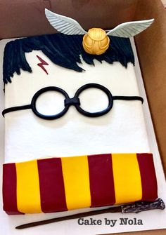 a harry potter birthday cake in a box