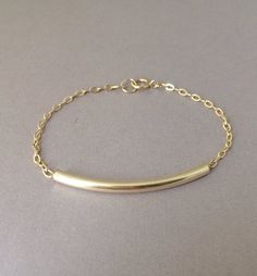 Gold Fill Curved Bar Bracelet Everyday Gold Oblong Jewelry, Minimalist Jewelry With Adjustable Oblong Chain, Gold Bar Necklace With Adjustable Chain For Everyday, Everyday Gold Bar Necklace With Adjustable Chain, Simple Gold Bar Necklace For Gift, Gold Oblong Jewelry With Adjustable Chain, Classic Gold Bar Necklace For Everyday, Simple Gold Brass Jewelry, Minimalist Brass Chain Bracelet For Gift