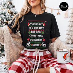 Funny Ugly Christmas Sweater T-Shirt Sarcastic Ugly Xmas Holiday Shirt This Is My Too Hot Ugly Christmas Sweater Matching Tees Family Christmas Vacation Gift Holiday Humor Office Shirt Gift XS Up to 5XL Our Bella + Canvas 3001 unisex shirt is a soft, boyfriend style tee. It has a comfortable and relaxed fit. It is flattering for both men and women. *Original design *Sizes are unisex - women may consider ordering a size down for a more fitted look *UNISEX shirts are long, please see sizing chart Winter Holiday Funny T-shirt, Black Winter Holiday T-shirt, Funny Winter Holiday T-shirt, Funny Black Christmas T-shirt, Funny Crew Neck T-shirt For Winter, Mens Holiday Shirts, Mens Christmas Shirts, Sarcastic Christmas, Sweater Tshirt