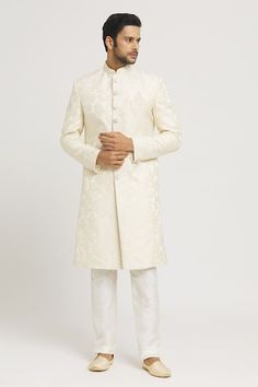 Cream brocade sherwani with tonal floral embroidery. Comes with cream pant. - Aza Fashions Formal Cream Churidar With Chikankari Embroidery, Formal Cream Sherwani With Straight Kurta, Formal Cream Sherwani Straight Kurta, Fitted Cream Churidar For Formal Occasions, Cream Sherwani, Cream Pant, Cream Pants, Floral Set, Aza Fashion